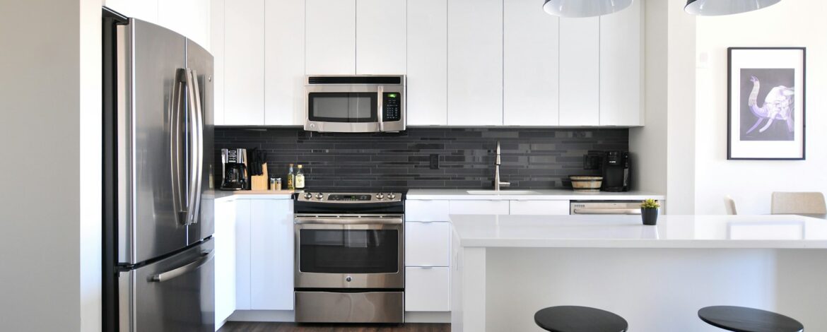 gray steel 3-door refrigerator near modular kitchen