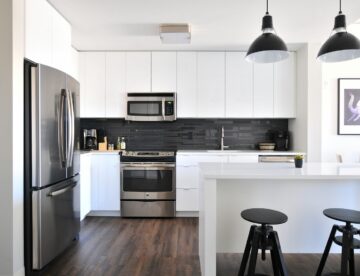 gray steel 3-door refrigerator near modular kitchen